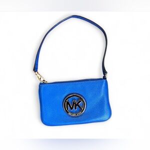 Michael Kors Fulton top-zip leather wristlet in a vibrant blue color